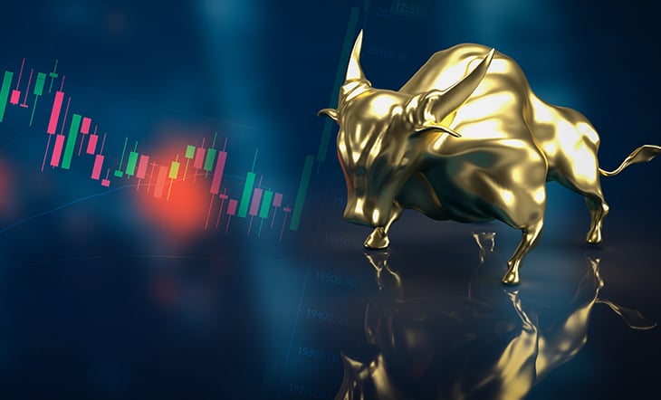 Gold bull on chart background